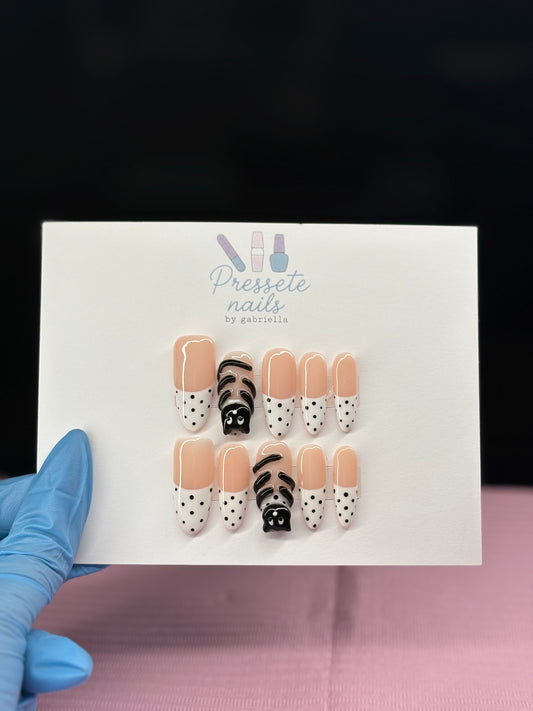 Black cat with polka dots